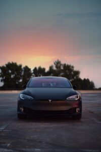 Tesla, the disruptor in the automotive industry, has achieved remarkable success through a combination of innovative technology, word-of-mouth marketing, and the charismatic leadership of Elon Musk.